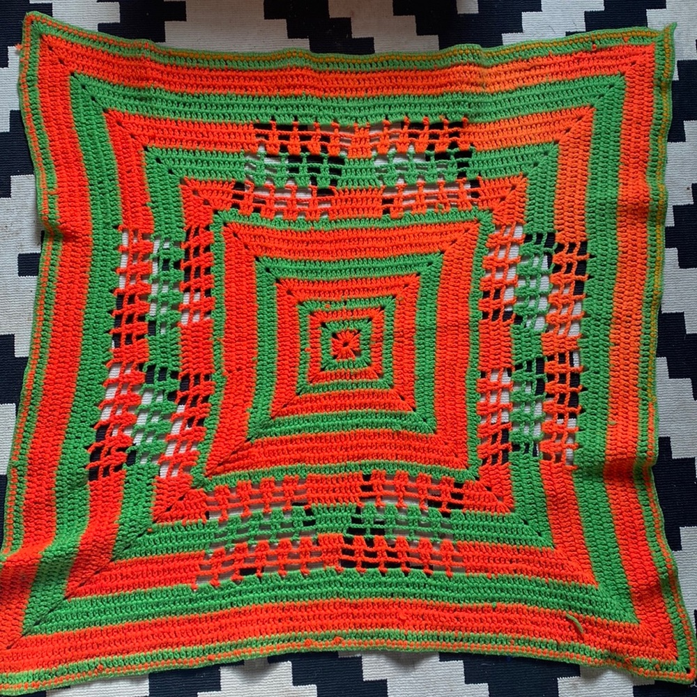 Vintage 35” x 40” orange and green Afghan wall hanging